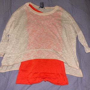 A cute layered tank with a net type shirt.